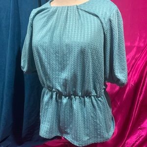 Suzy shier size M turquoise 3/4 sleeve top. Cinch waist. Waffle like material